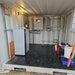 EndurEnergy ESP-BU20 Battery Storage Unit set up inside a shed, illustrating the flexibility of installation locations